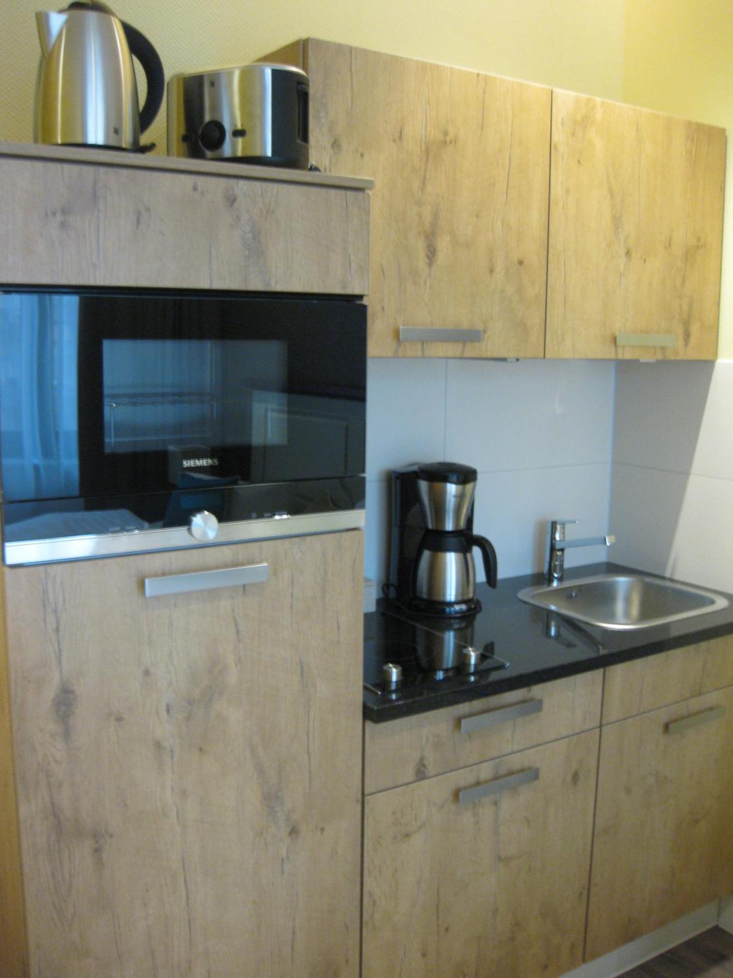 - Aparthotel
